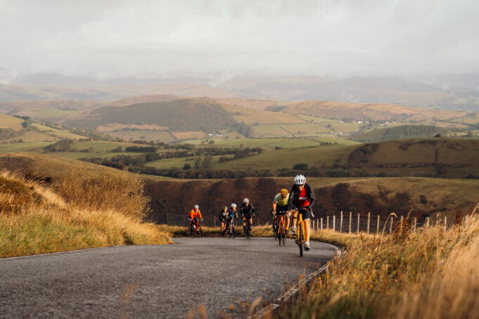 Cyclists on a winding mountain road