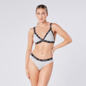 Woman in grey and black bra and pants