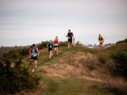 Kullamannen Race Preview 5 runners run over a small hiillock