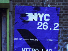 PUMA brings NITRO™ Lab to NYC A deep blue poster against a brick wall reads NYC 26.2 Nitro Lab