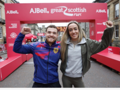 35,000 runners take part in Great Scottish Run Eilish McColgan and a young man stand in front of the start line, arms around shoulders, one arm each in the air, smiling