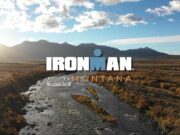 Ironman Montana logo over a flat prairie type landscape